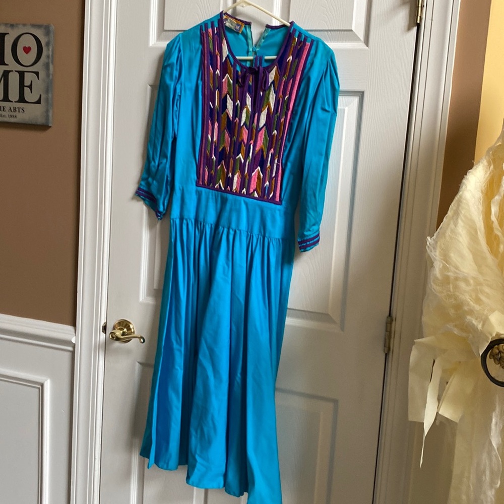 Long teal dress made, and purchased in Mexico